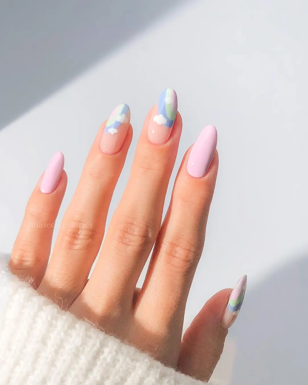 Charming pastel cloud nail art design