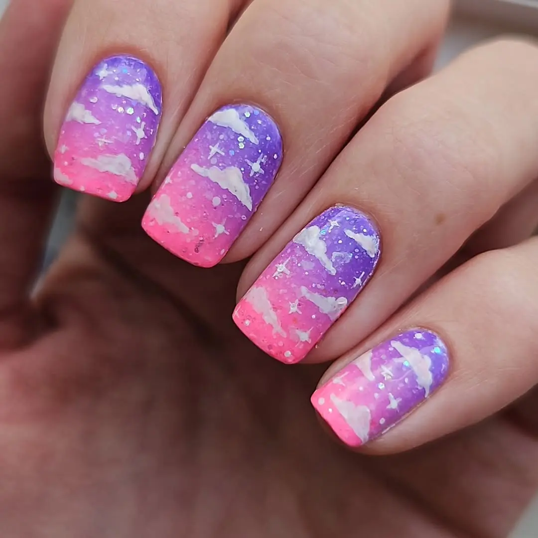 Vibrant Cloud Nails with Ombre Gradient