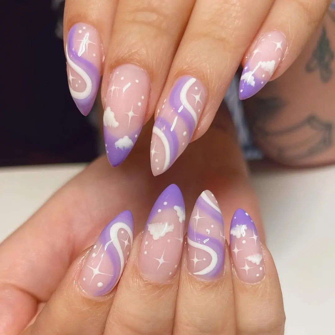 Whimsical cloud nails with purple accents