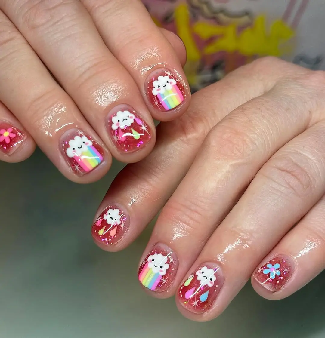 Whimsical cloud nails with radiant rainbows