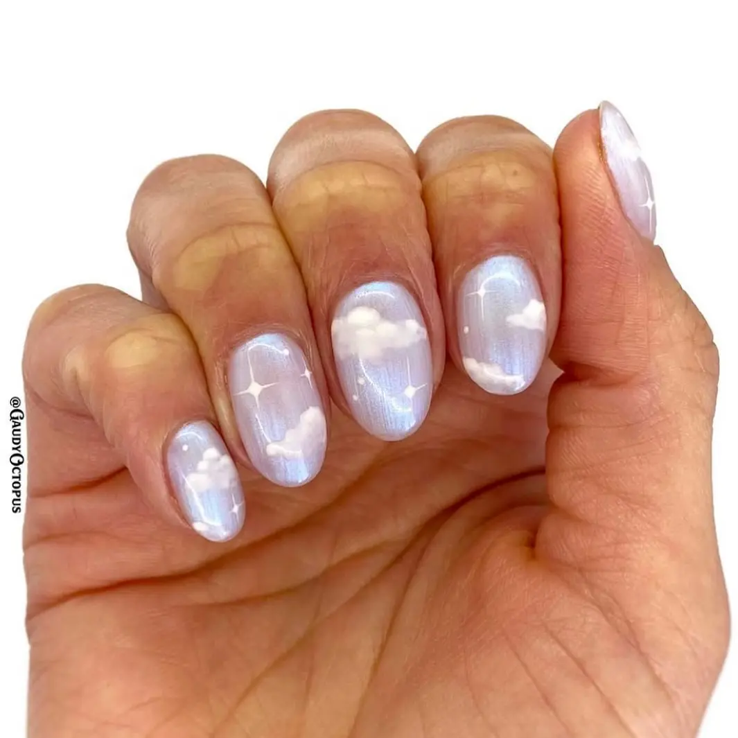 Charming cloud-inspired nail art design