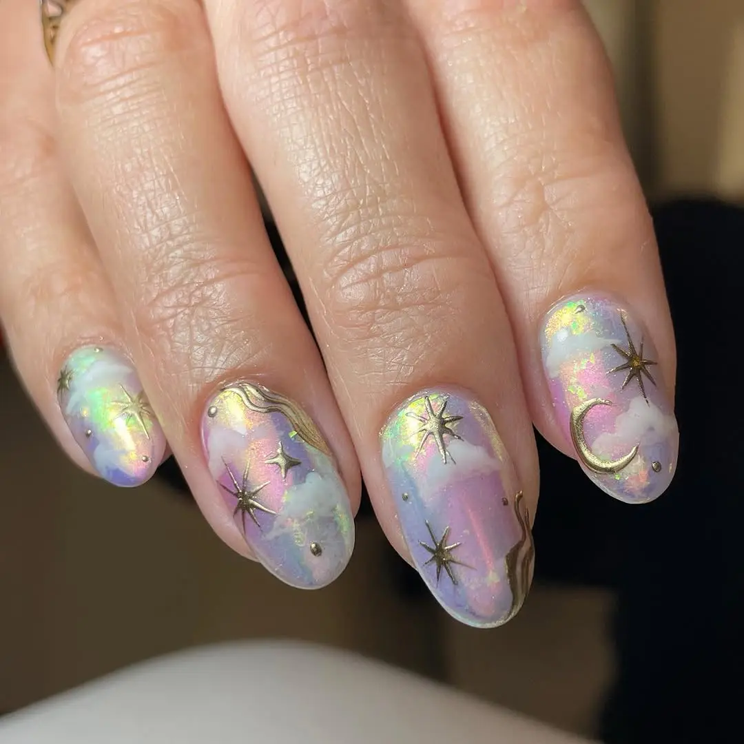 Stunning cloud nails with starry accents