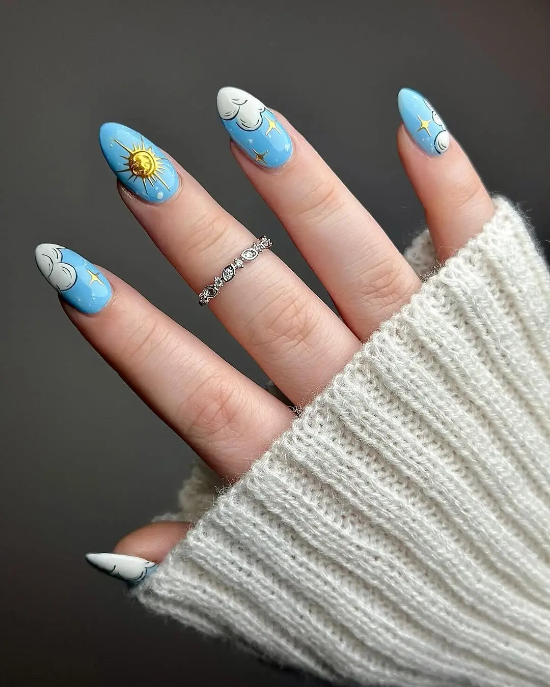 Sunny clouds design on stylish long nails