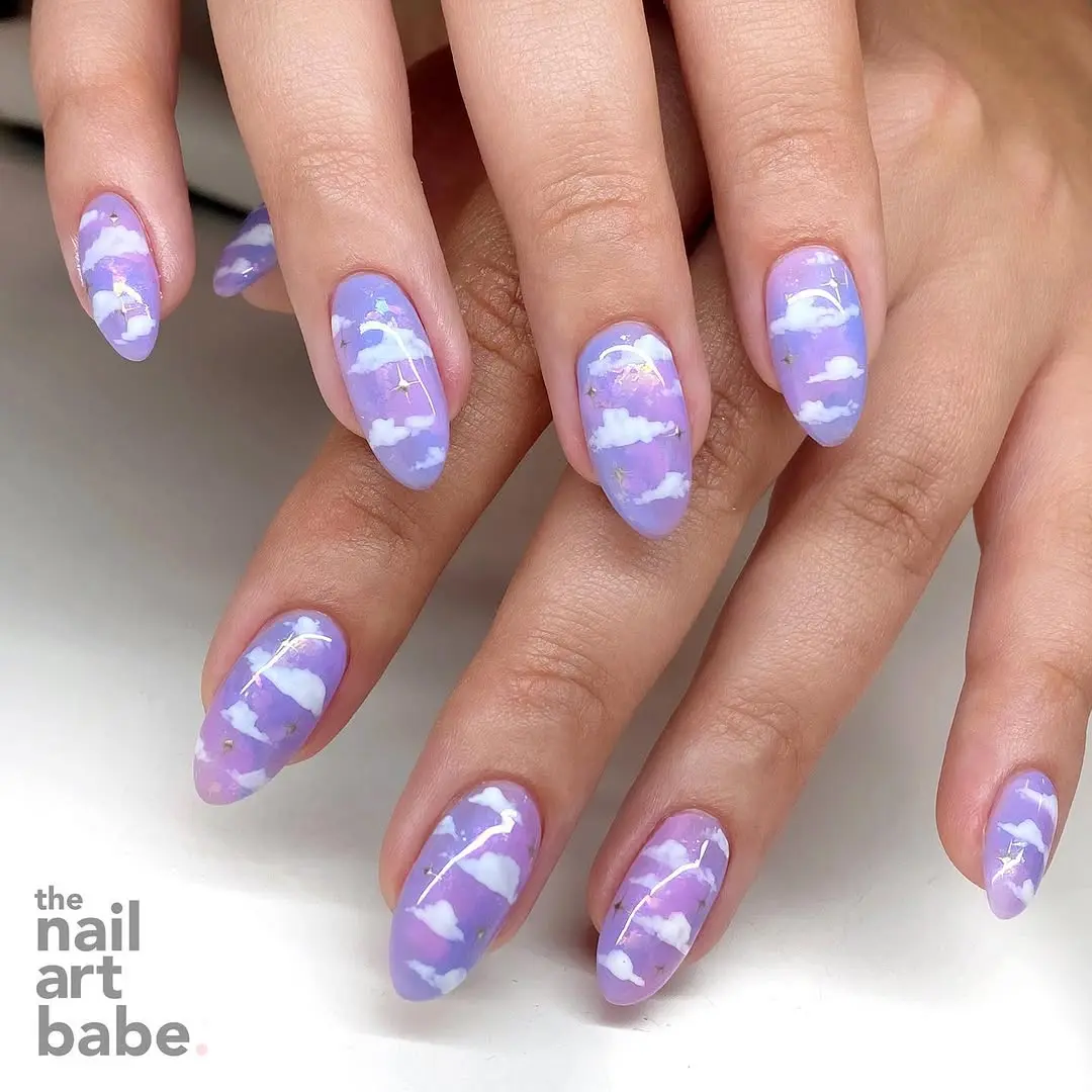 Dreamy violet cloud nails for whimsical vibes