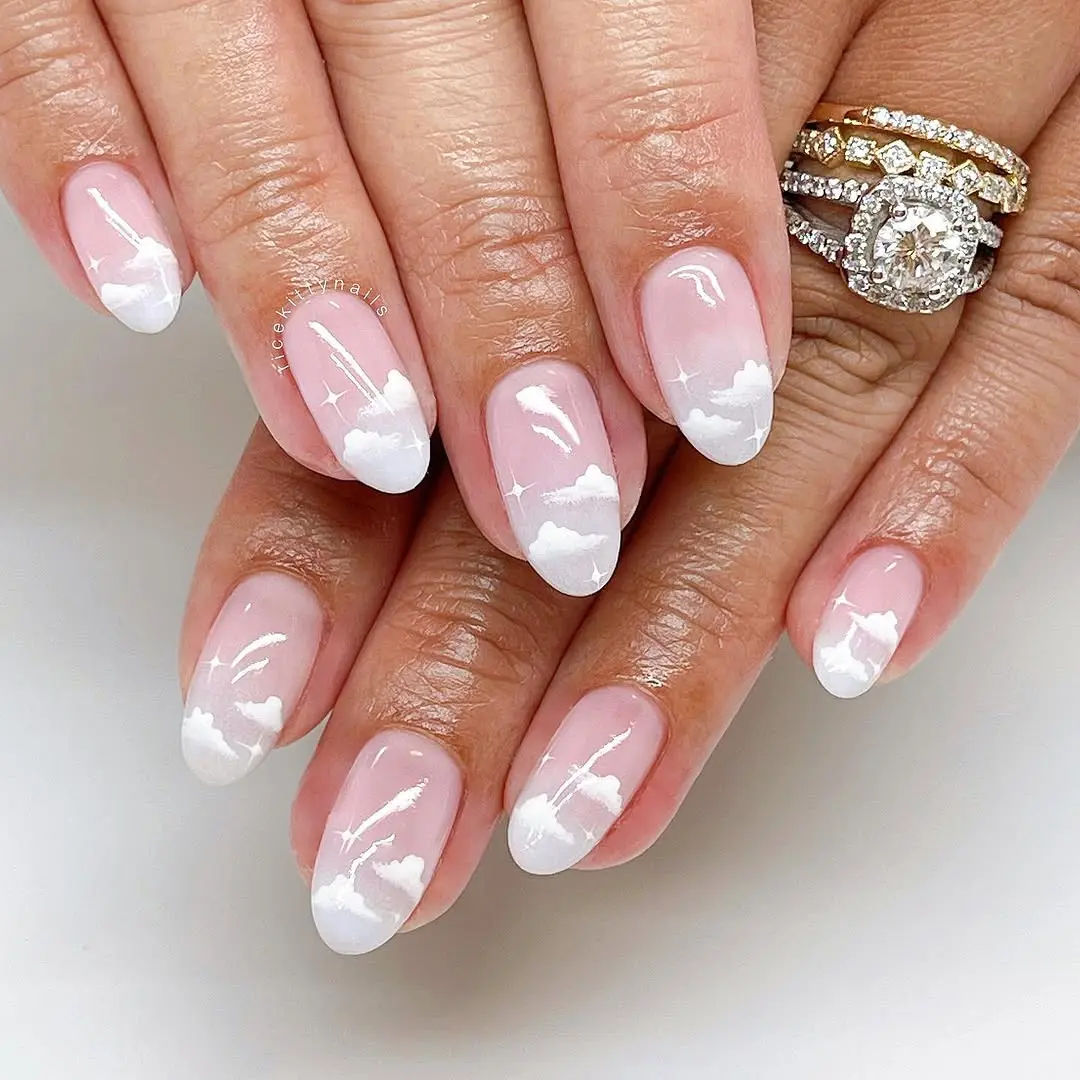 Elegant Cloud Nail Art with Sparkling Details