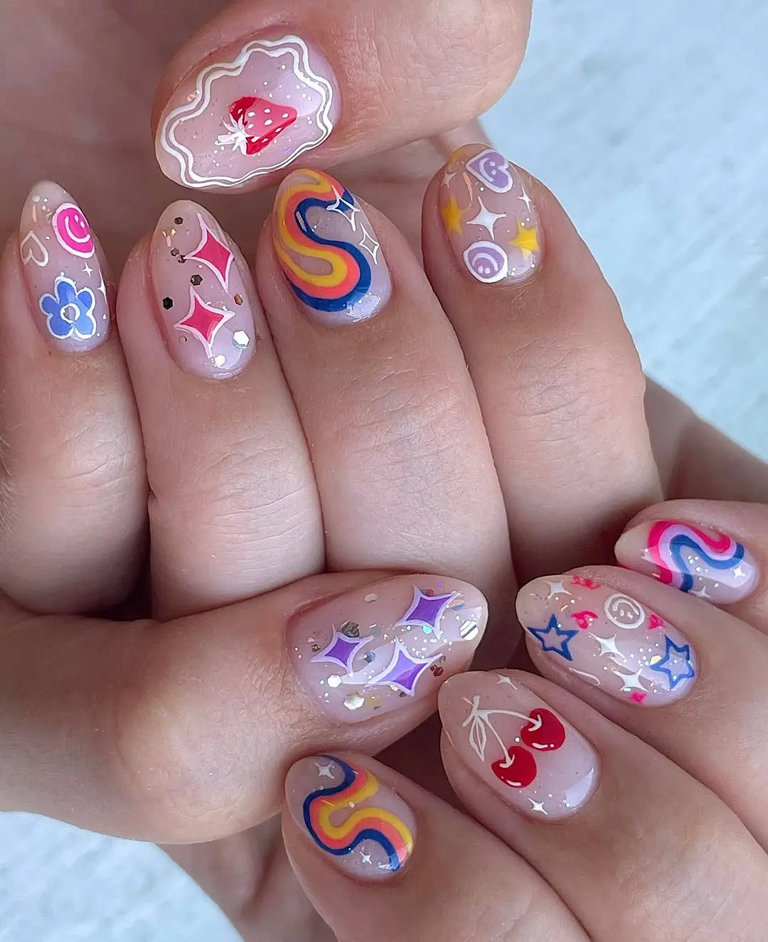 Playful and colorful birthday nail designs