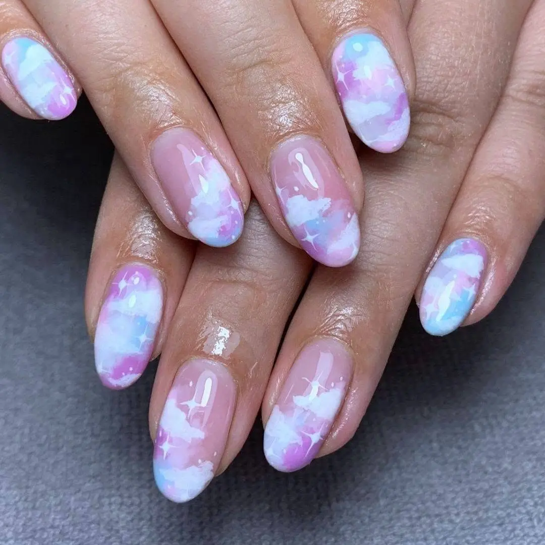 Charming pastel cloud-inspired nail art design