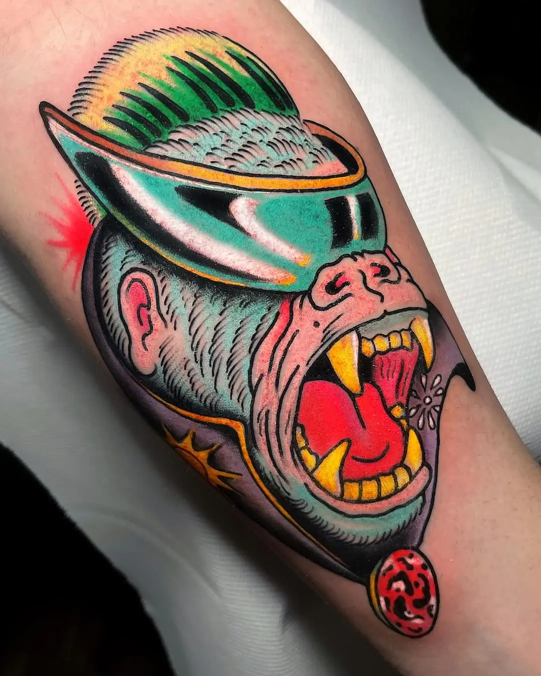 Vibrant gorilla tattoo with a unique style