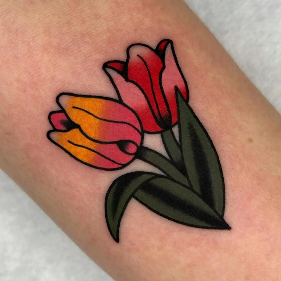 Vibrant tulip tattoo showcasing bold colors