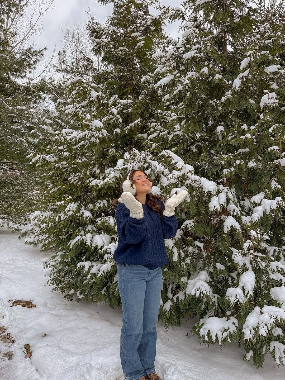 Cozy winter style in a snowy setting