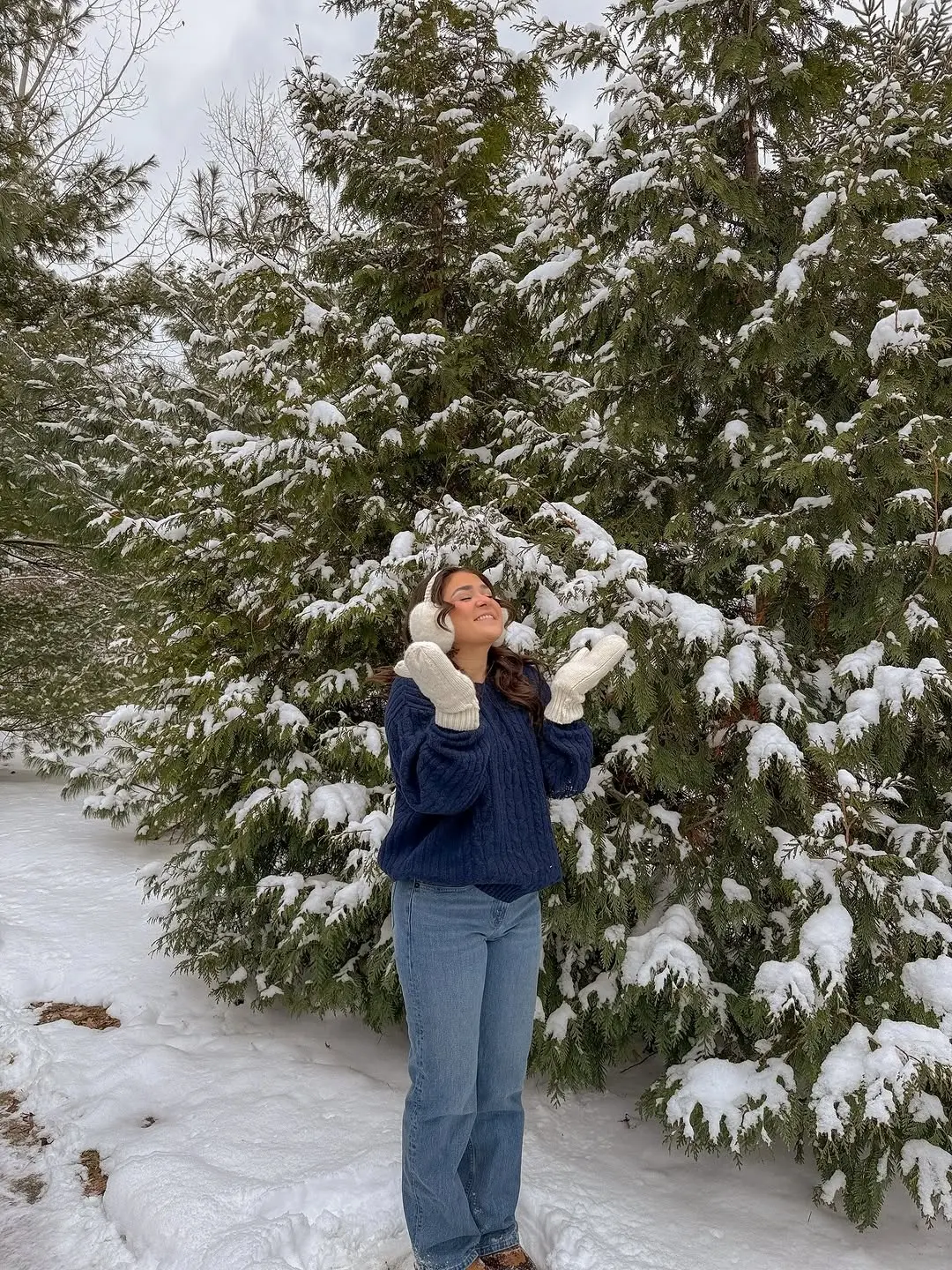 Cozy winter style in a snowy setting