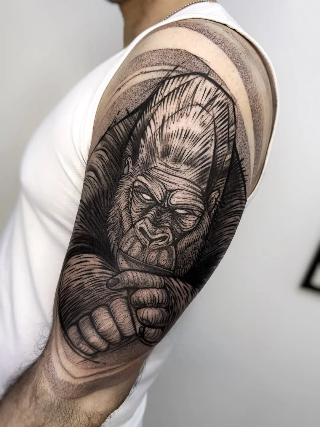 Stunning black and gray gorilla tattoo masterpiece