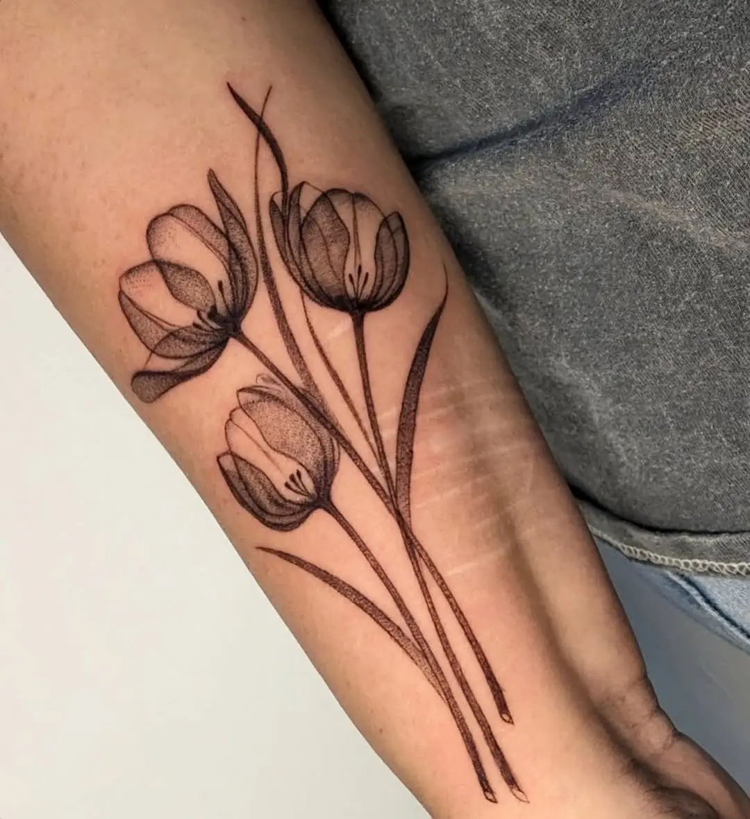 Elegant Tulip Tattoo on Forearm