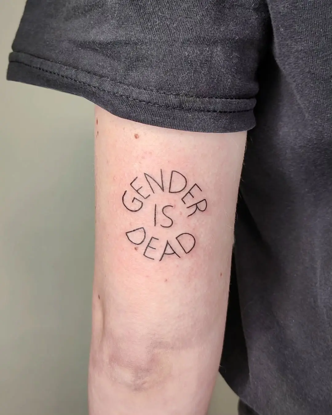 Bold statement tattoo challenging gender norms