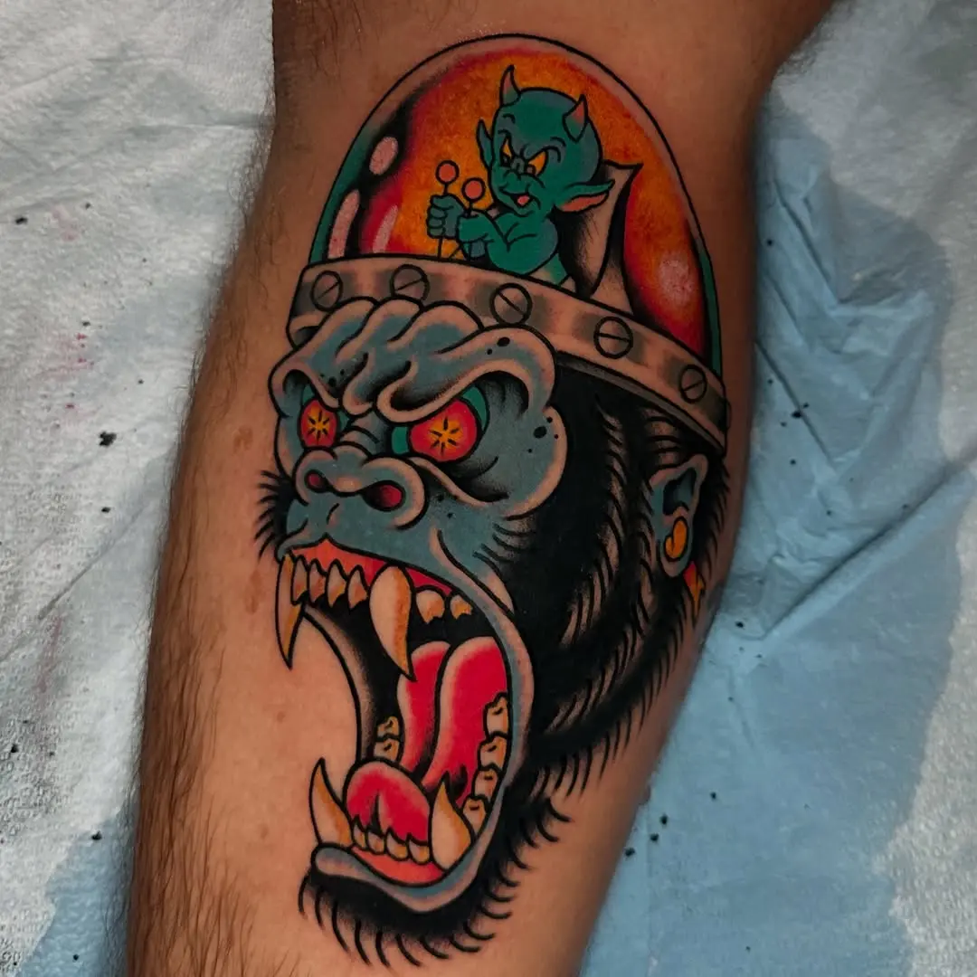 Vibrant Gorilla Tattoo with Playful Character
