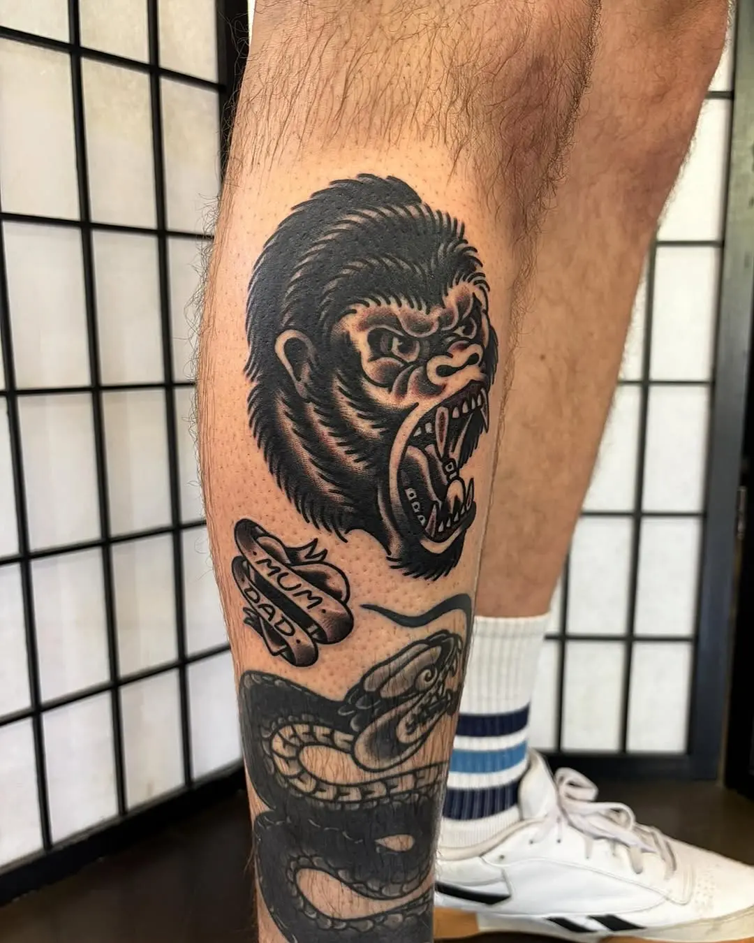Bold gorilla tattoo with fierce expression