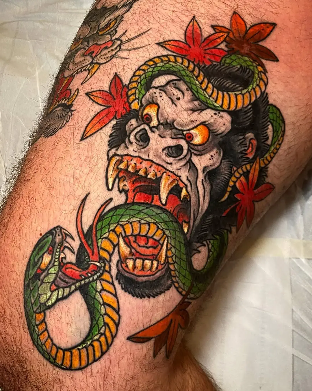 Vibrant gorilla tattoo showcasing fierce expression