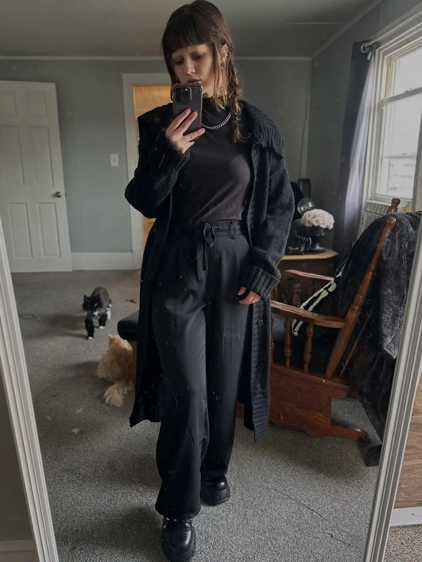 Chic black ensemble with layered textures
