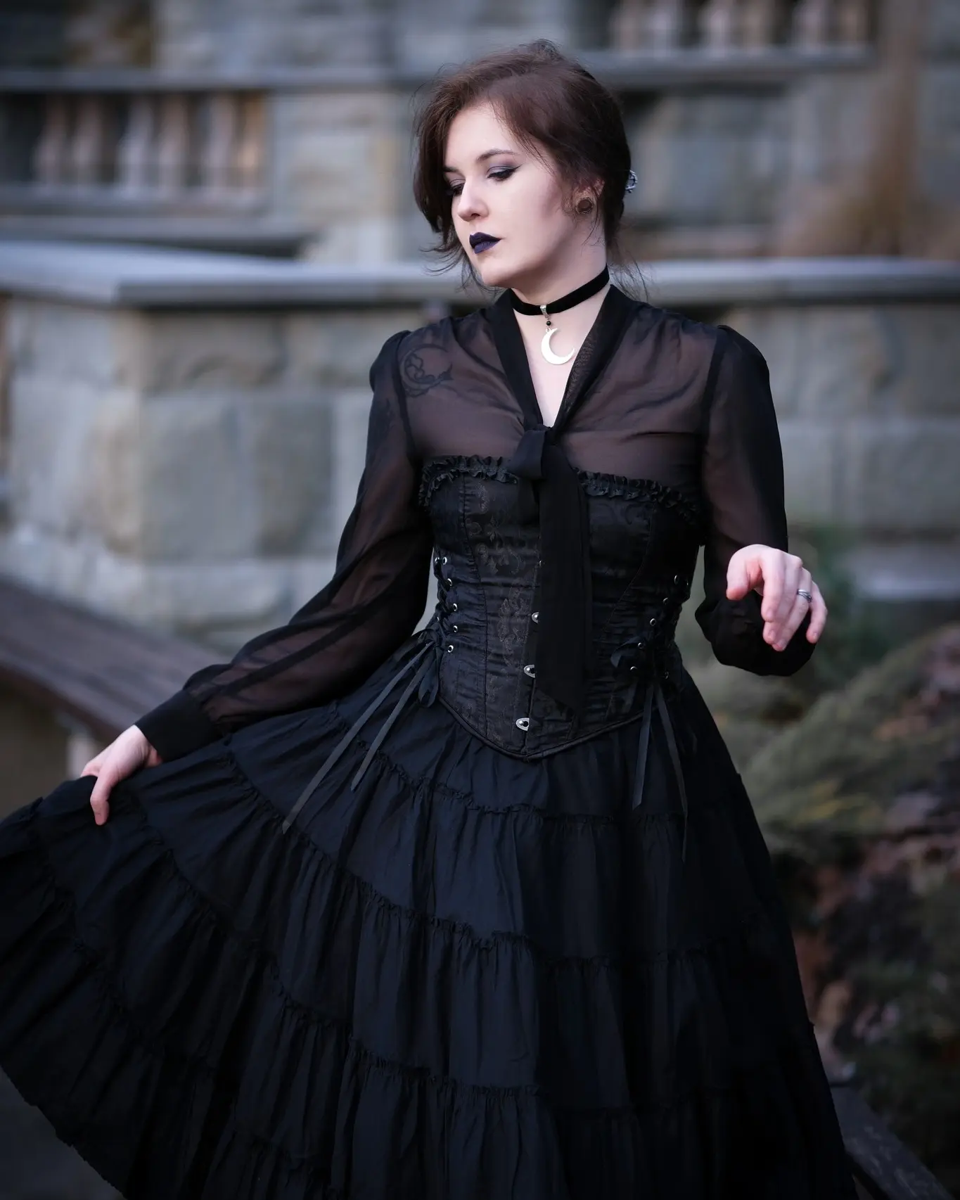 Elegant gothic corset with flowing black skirt