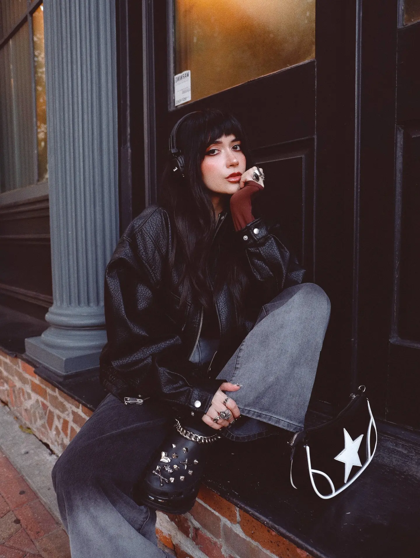Edgy Goth Look with Star-Studded Accessories