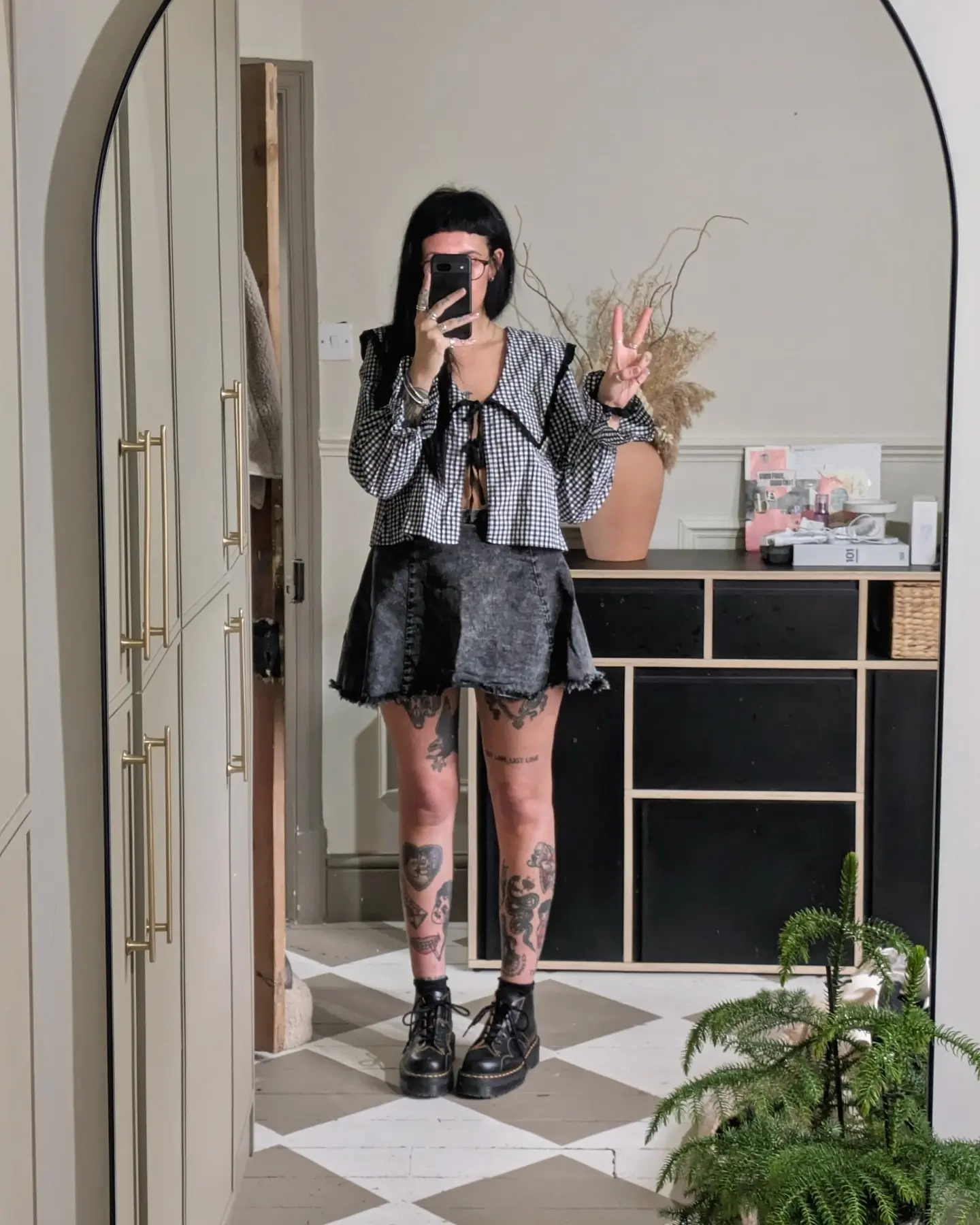 Chic Layered Goth Attire with Unique Textures