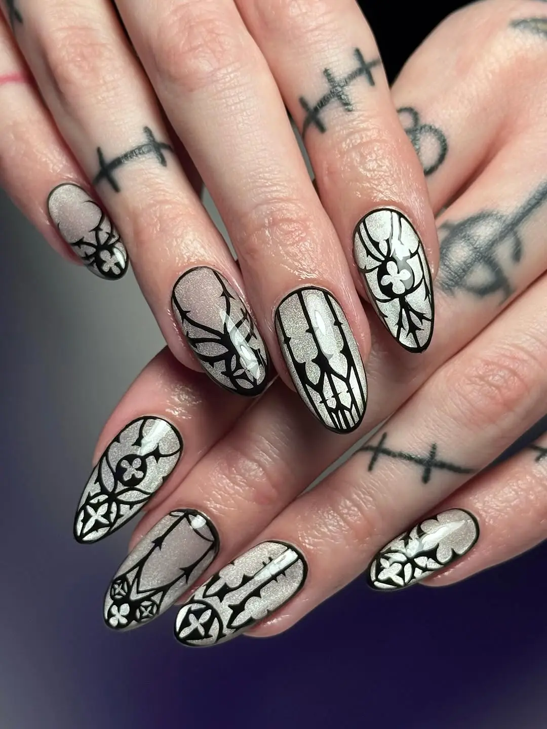 Striking Gothic Nail Art with Intricate Designs