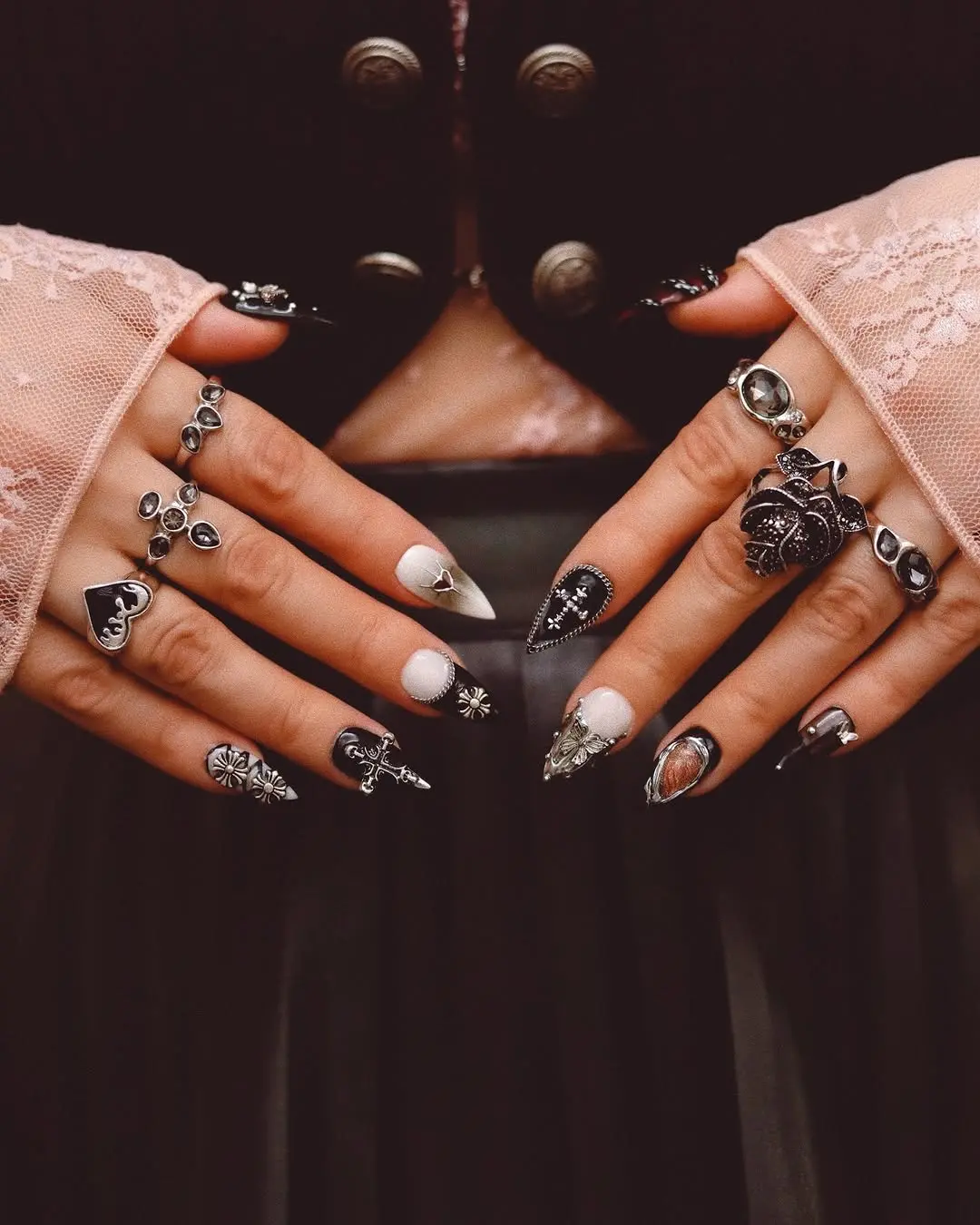Elegant Gothic Nail Art with Unique Accessories