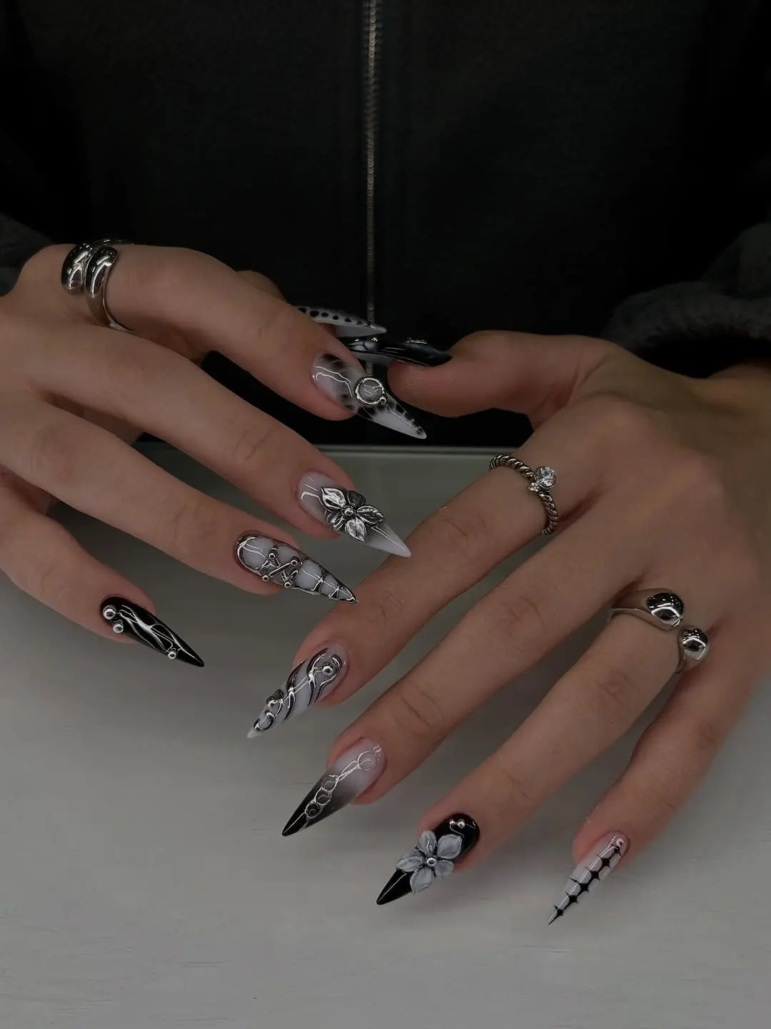 Striking black and white gothic nail art