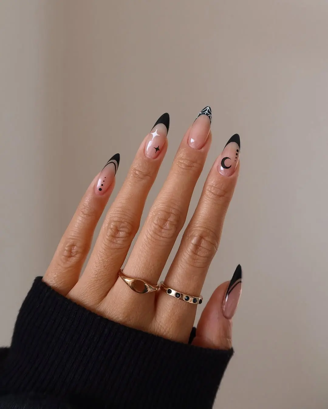 Stylish gothic nails with celestial vibes
