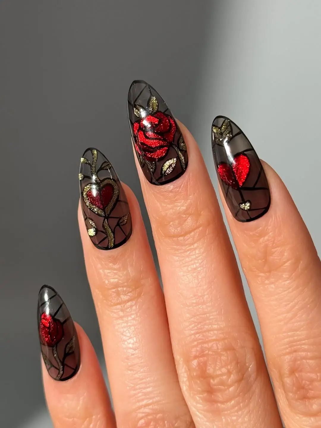 Elegant gothic nails with roses and hearts