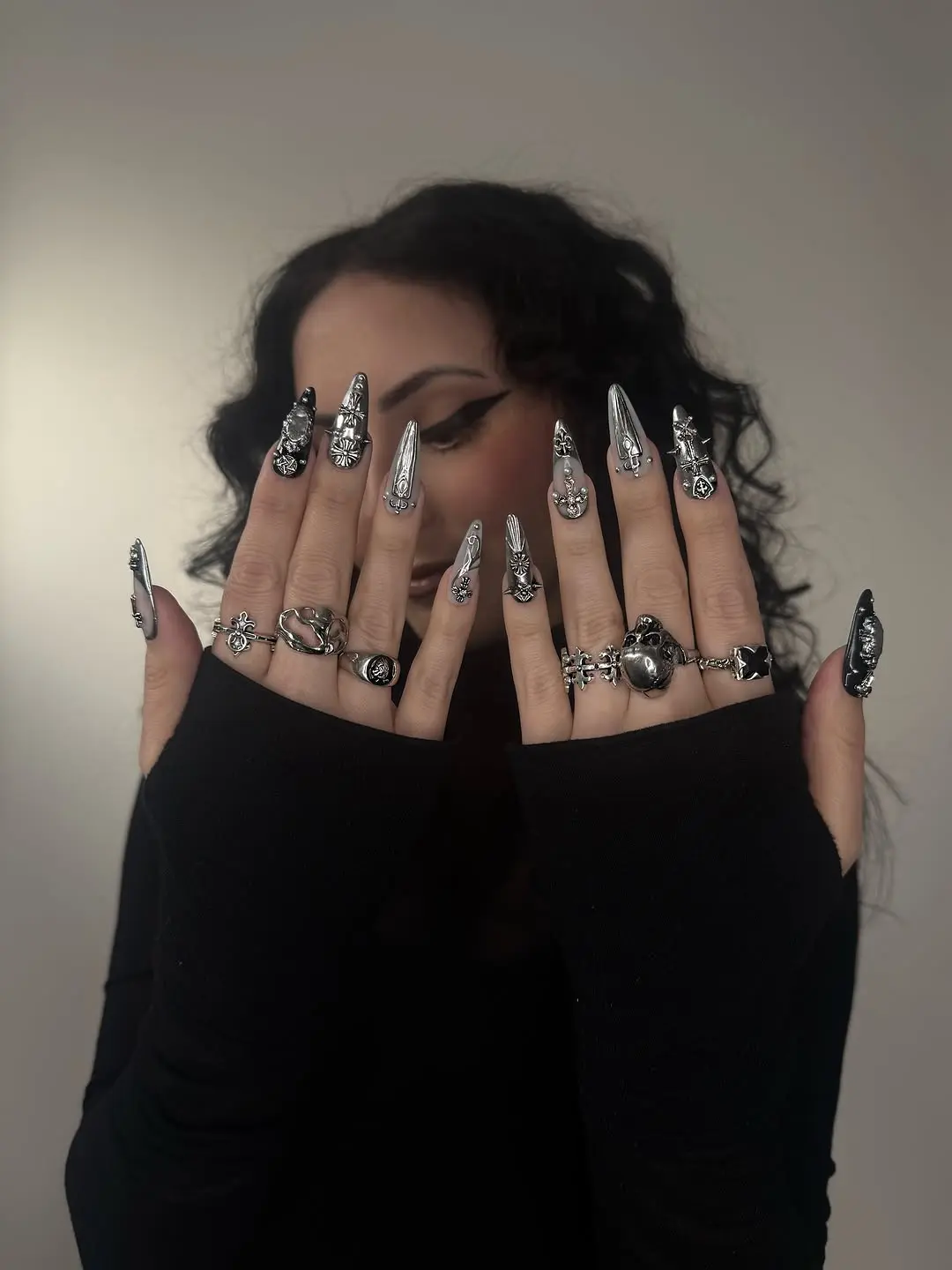 Striking silver gothic nails with intricate designs