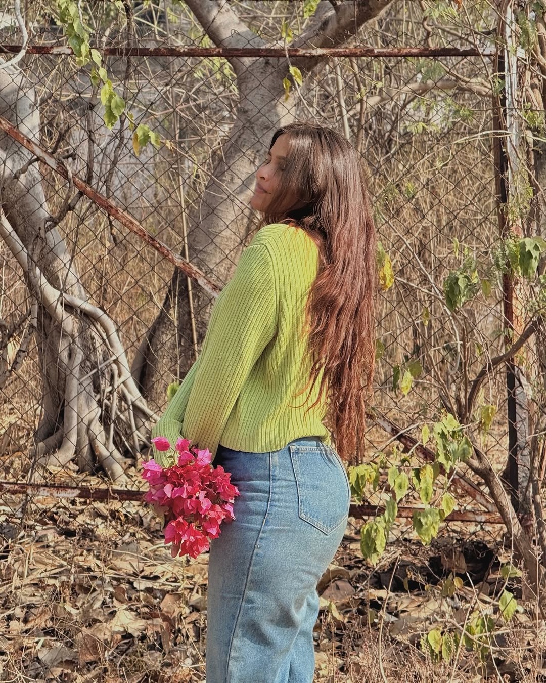 Chic Green Sweater with Floral Accents