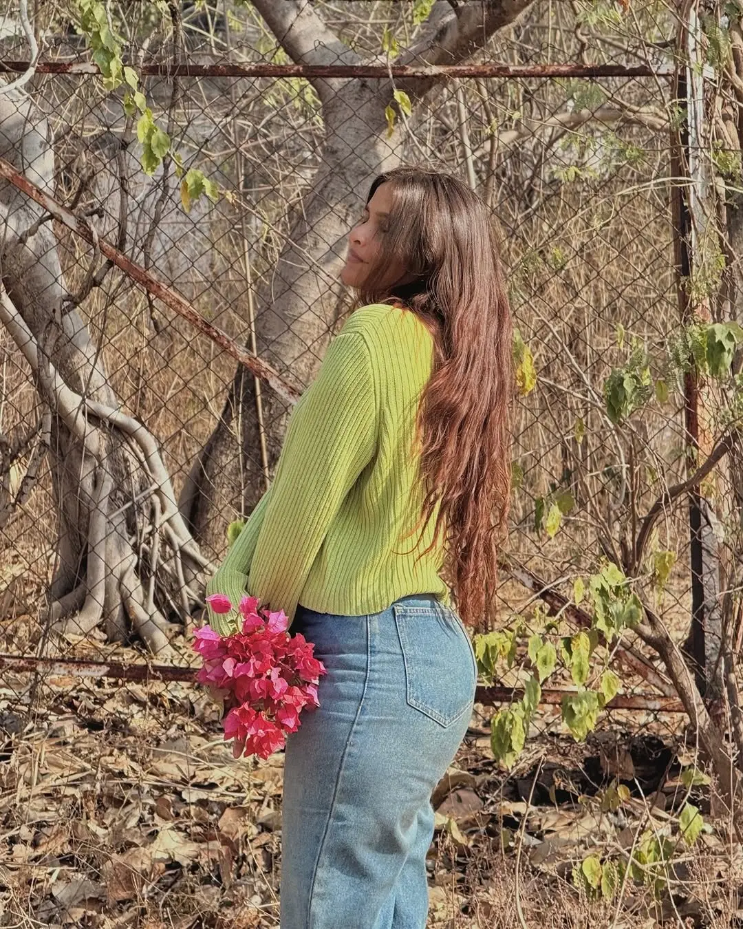 Chic Green Sweater with Floral Accents