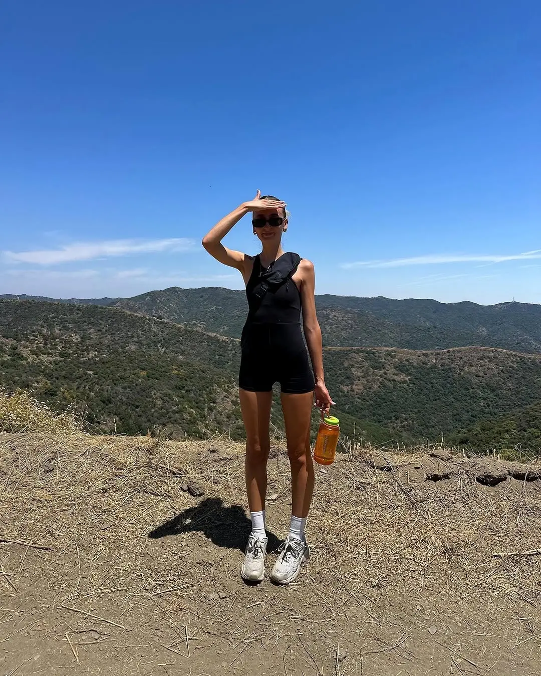 Chic Black Bodysuit Perfect for Hiking Adventures