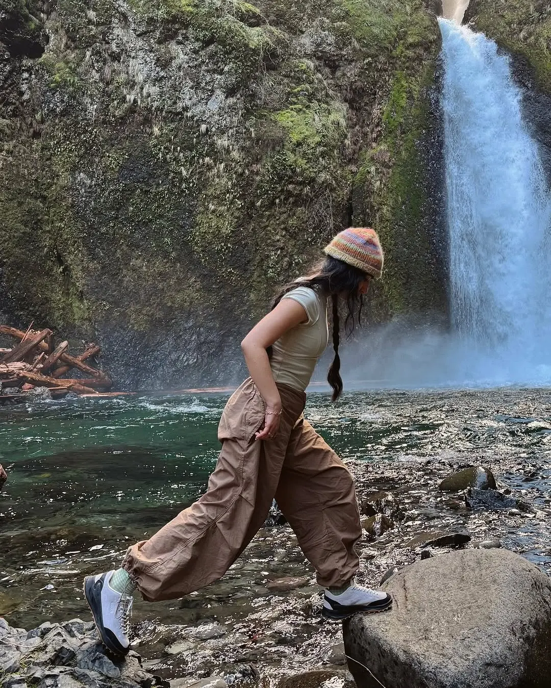 Stylish Hiking Outfit by a Waterfall