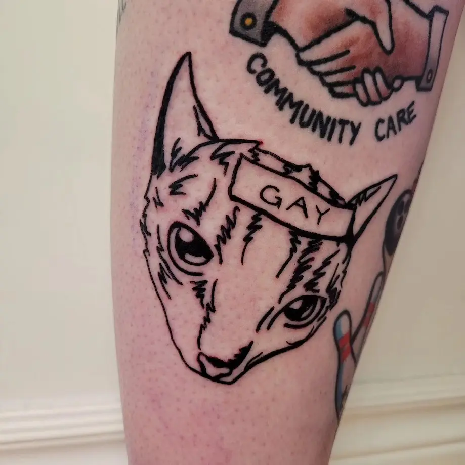 Unique feline tattoo celebrating LGBTQ+ pride