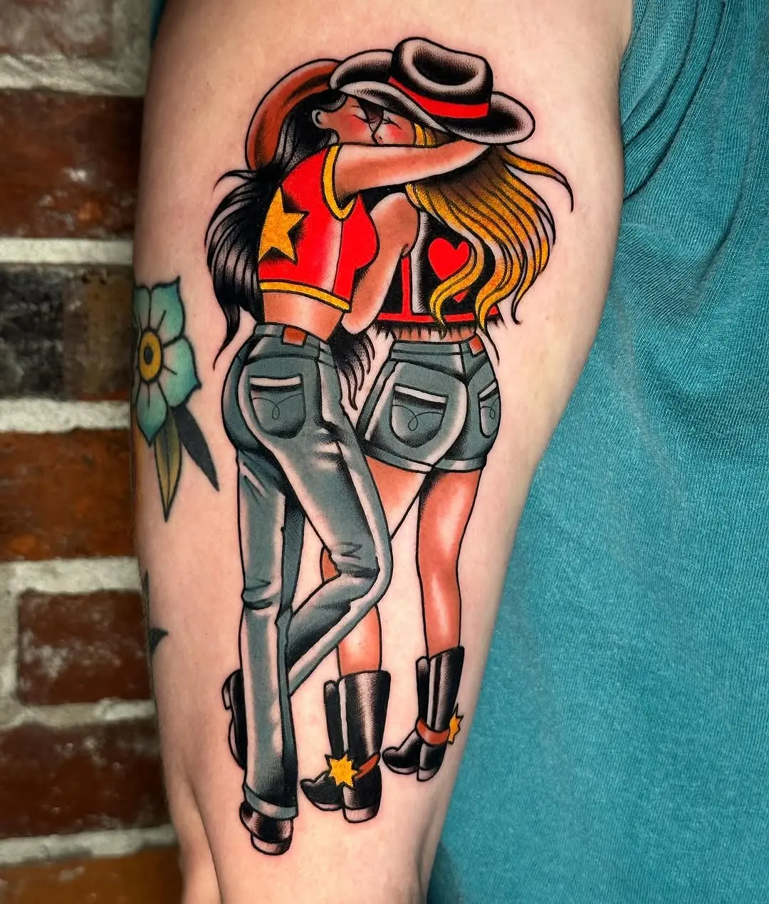 Vibrant Lesbian Couple Embracing Tattoo