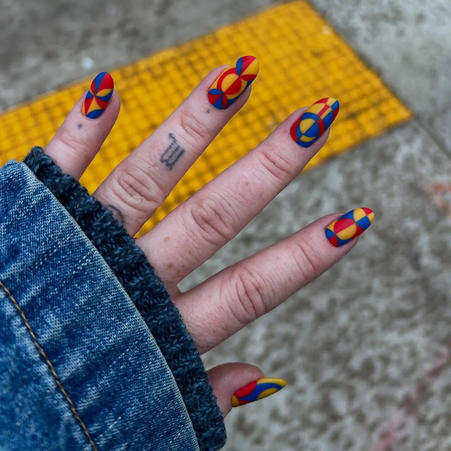 Vibrant geometric patterns for bold nail art