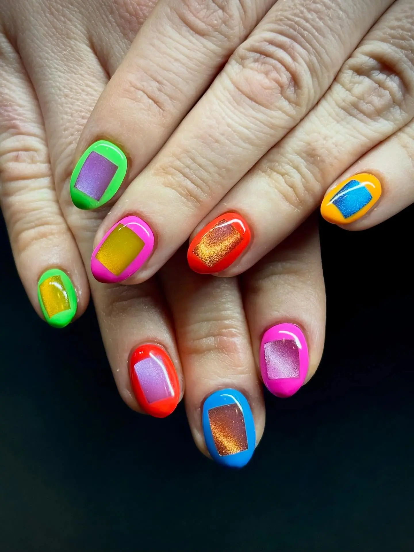 Bright and bold geometric nail art inspiration