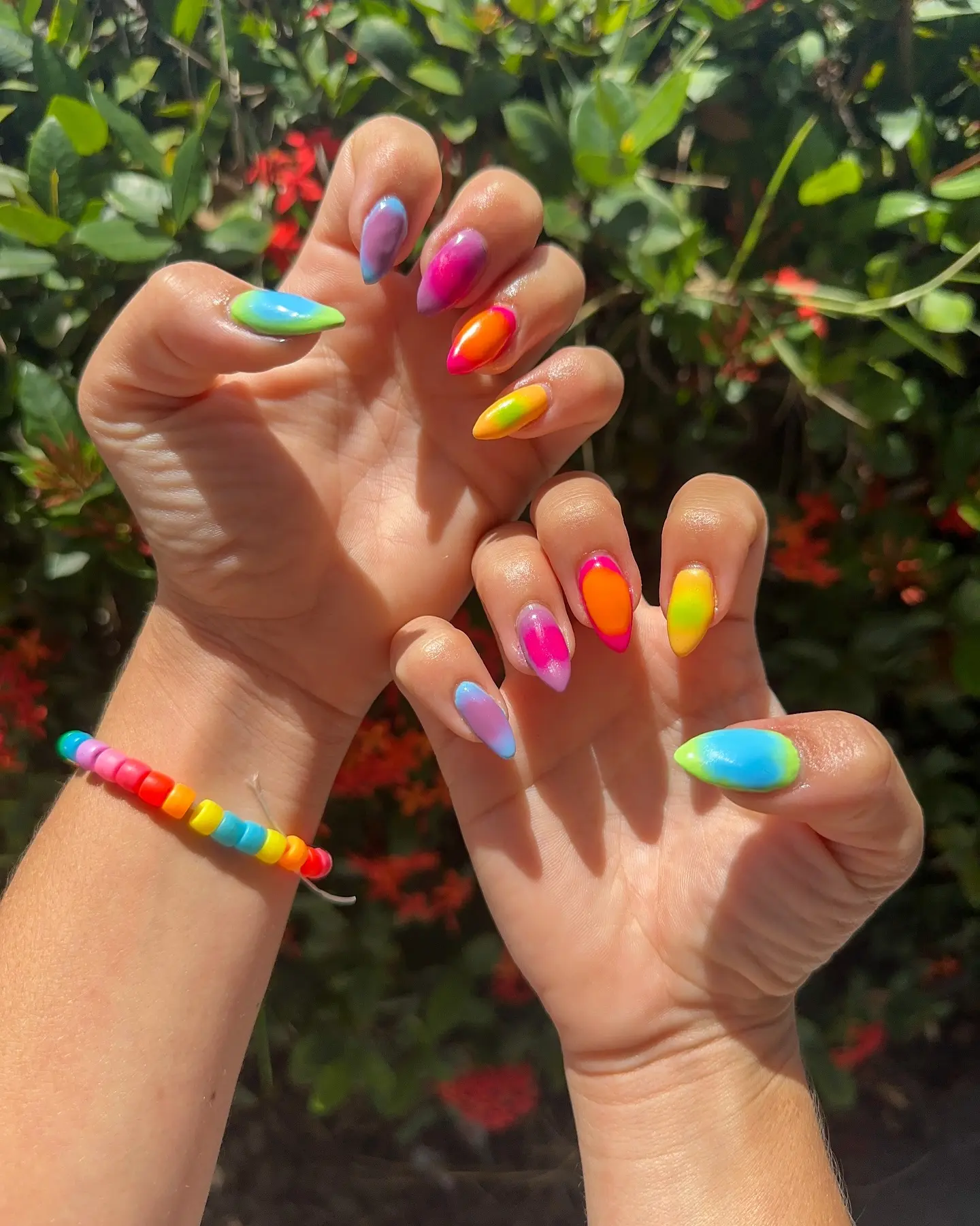 Vibrant rainbow nails for bold self-expression