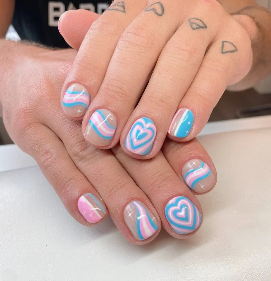 Colorful heart patterns in LGBTQ+ nail art