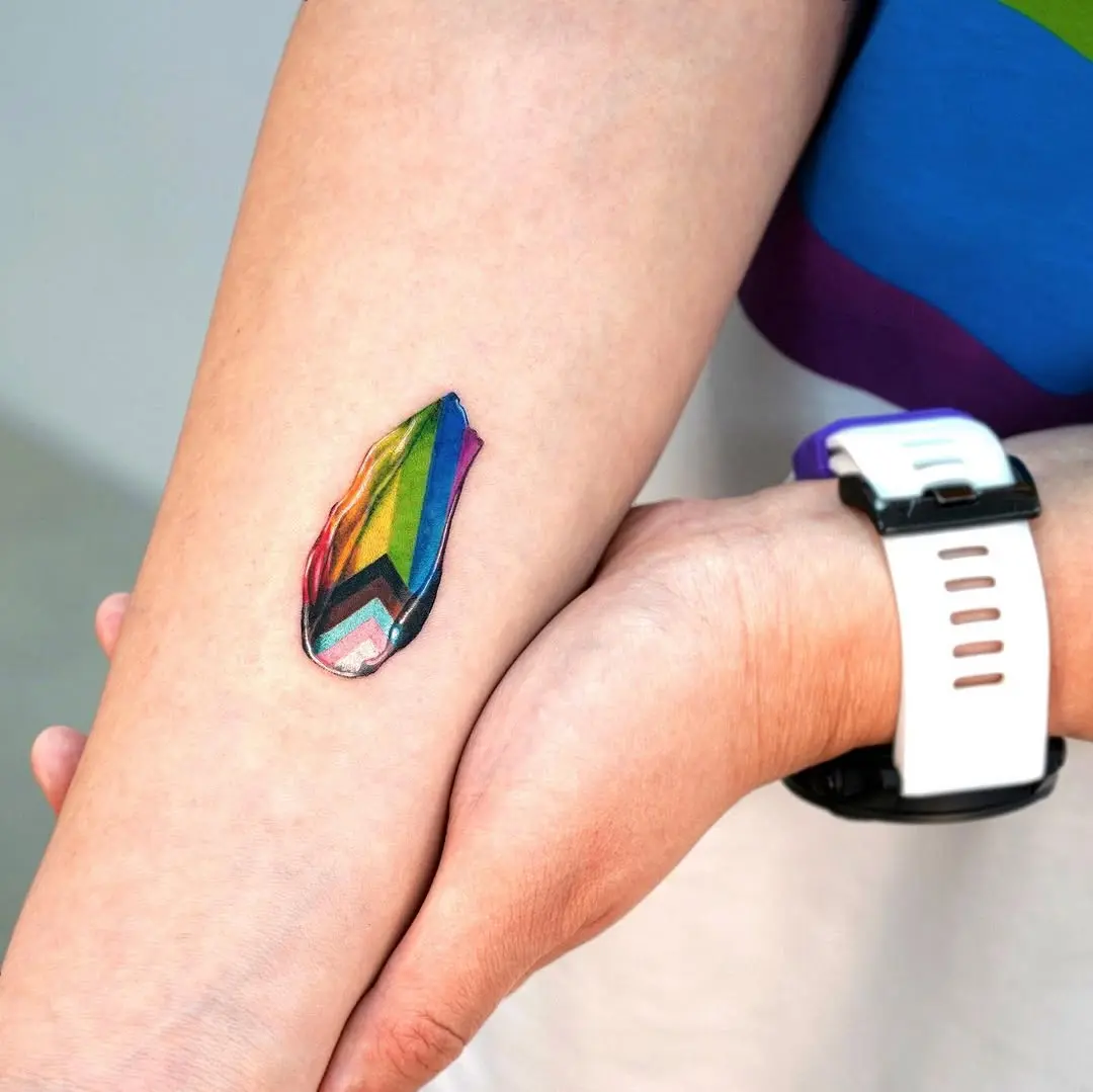 Vivid Rainbow Tattoo Expressing Identity