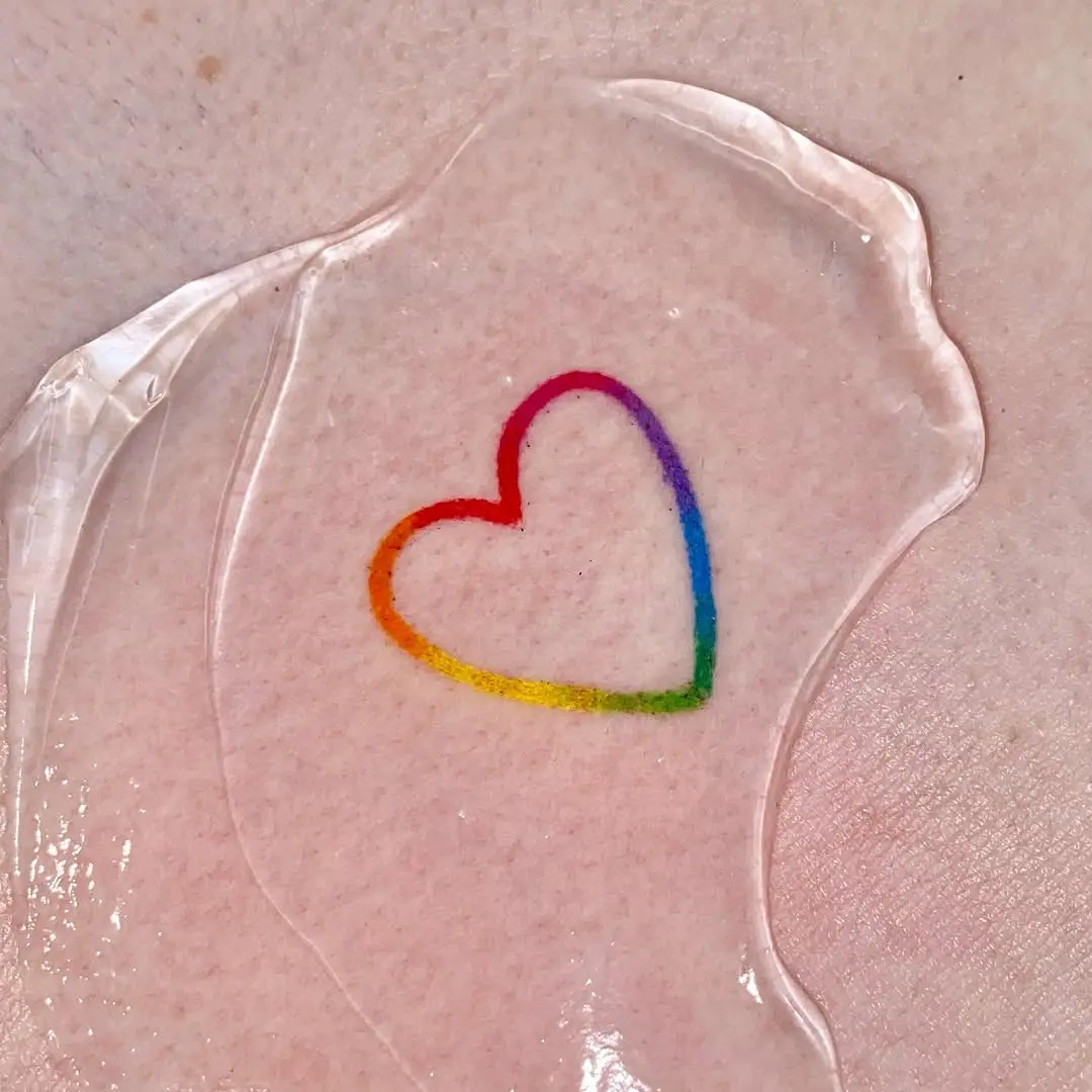 Vibrant Rainbow Heart Tattoo Inspiration