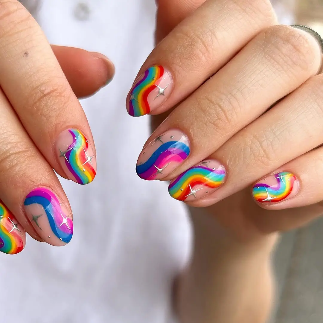 Vivid rainbow swirl nail art design
