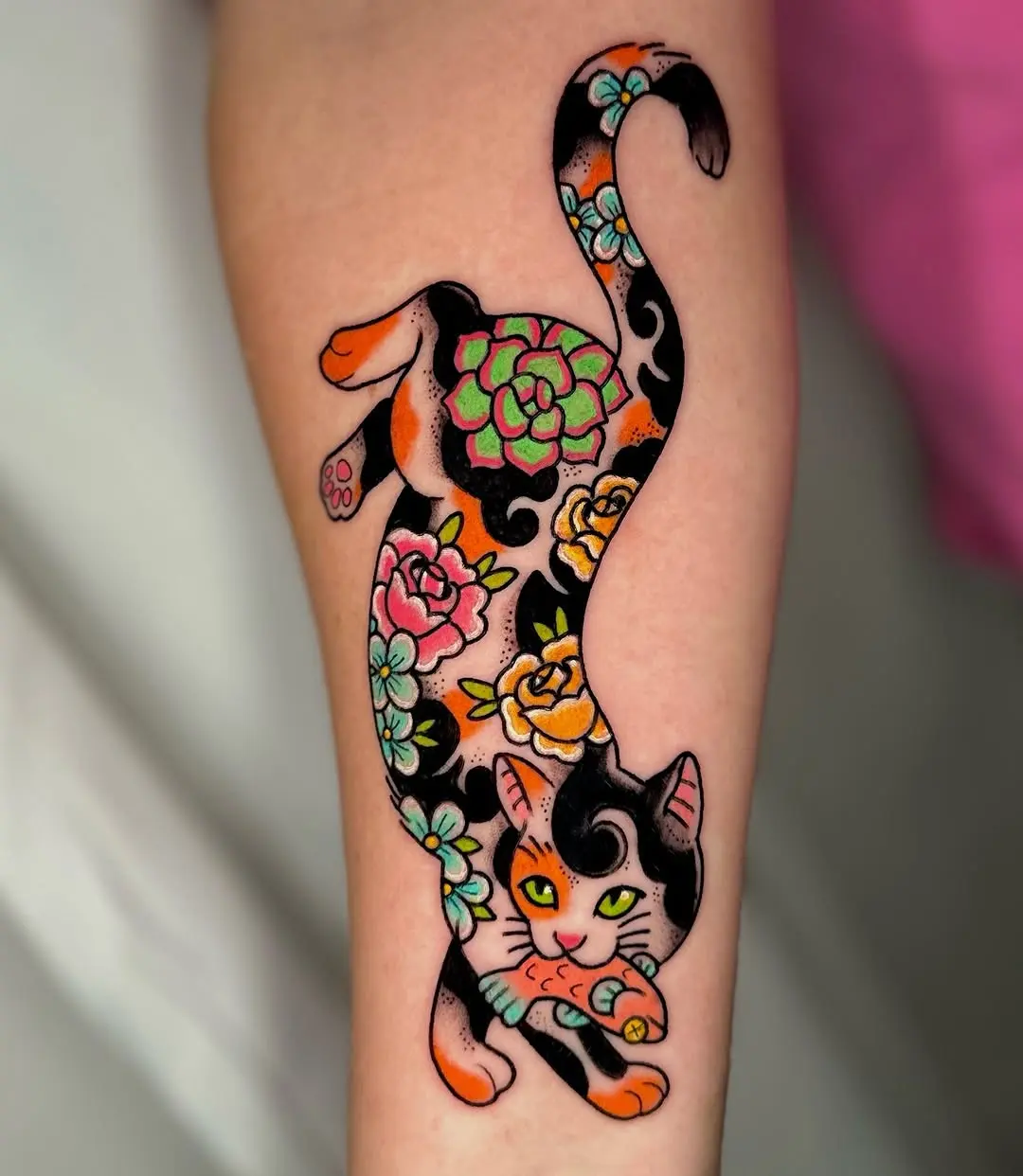 Vibrant Cat Tattoo with Floral Elements