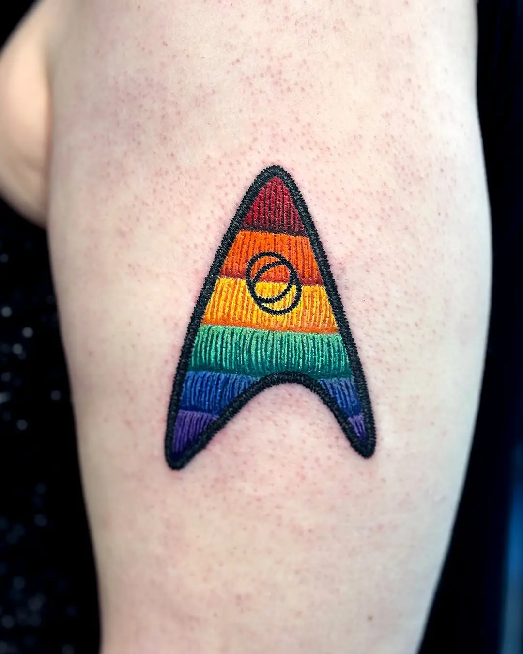 Bold Pride Tattoo with Starfleet Inspiration
