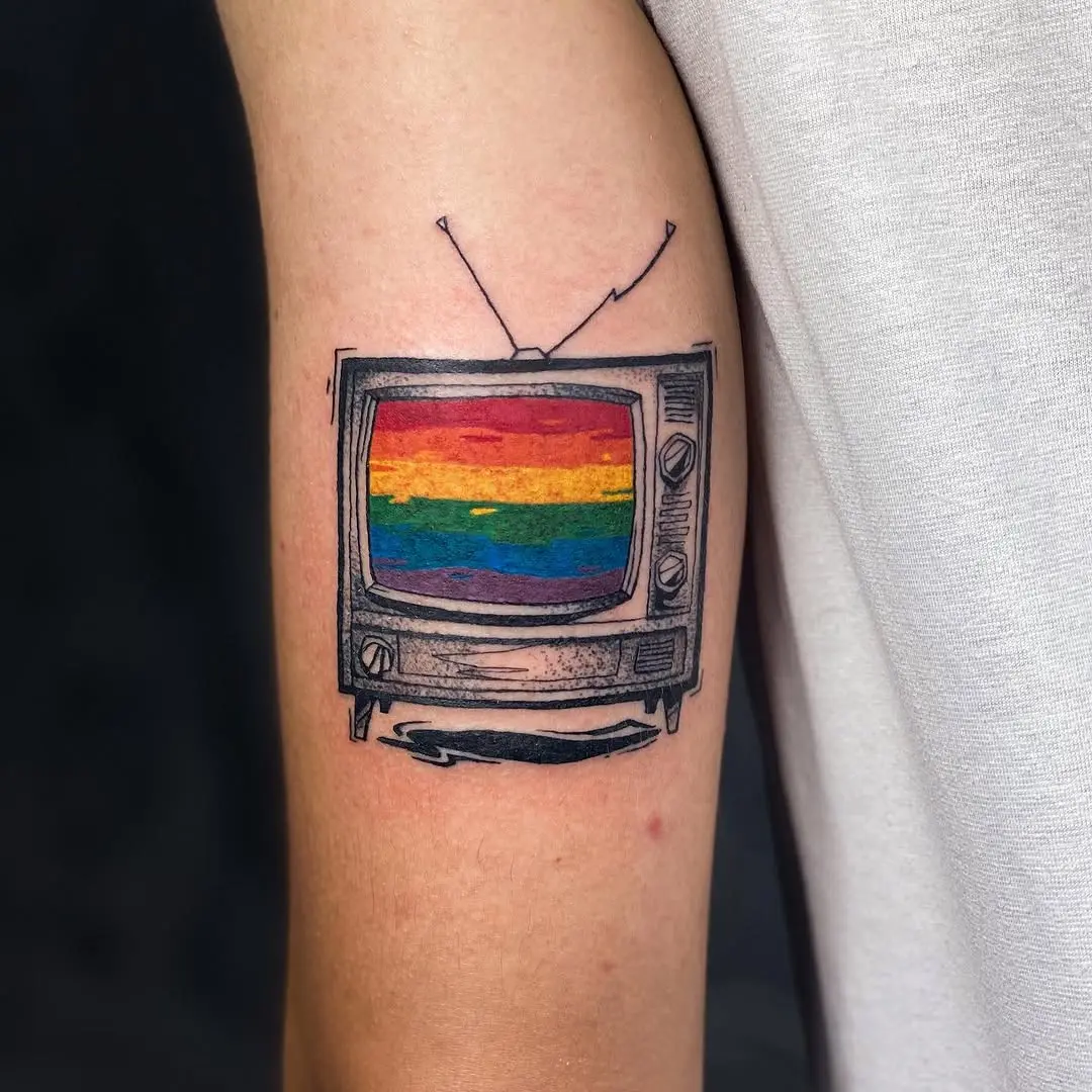 Colorful rainbow TV tattoo celebrating LGBTQ+ pride