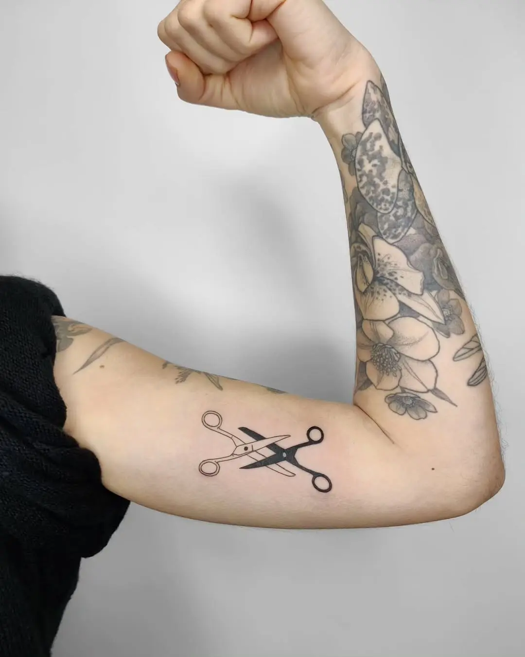 Bold Scissors Tattoo Symbolizing Empowerment