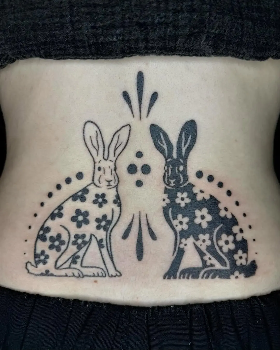 Playful rabbits with floral patterns and dots