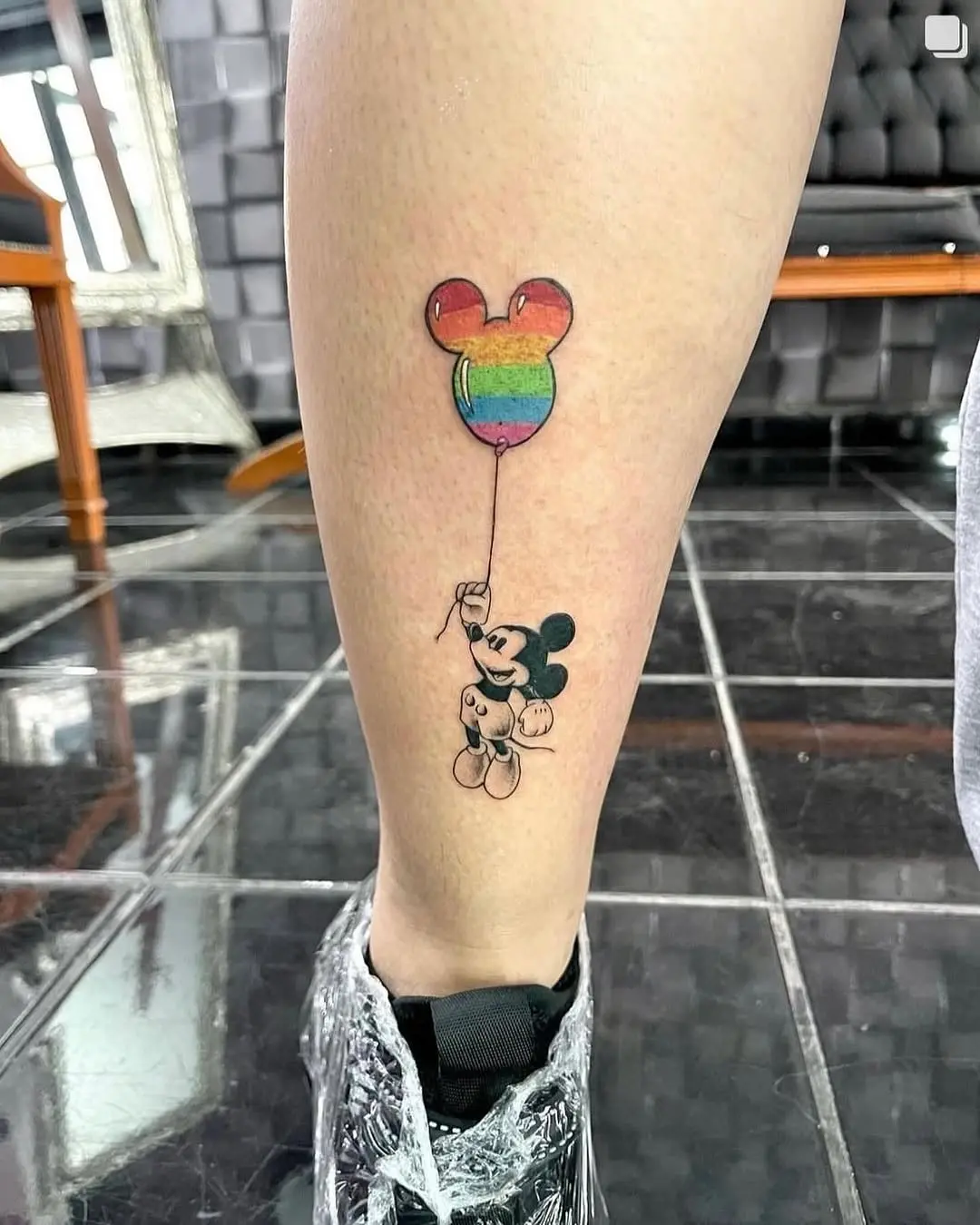 Playful Mickey Mouse with Rainbow Balloon Tattoo
